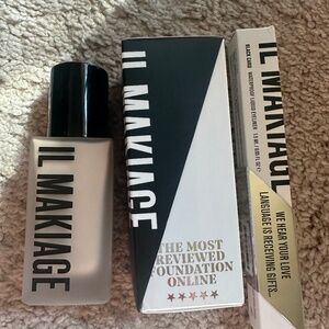 New. Foundation and eye liner. 2 piece set